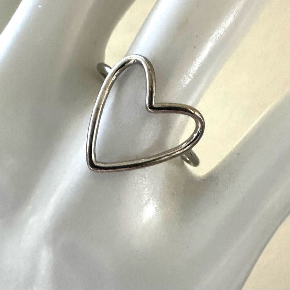 Silver tone open heart ring